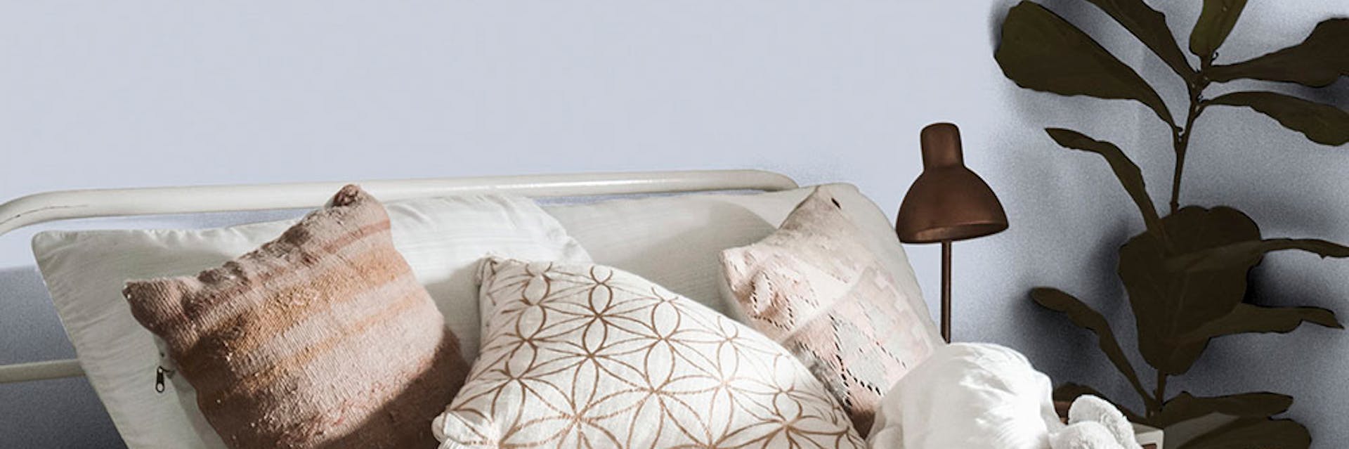 Stylish bedroom painted in a lilac paint colour