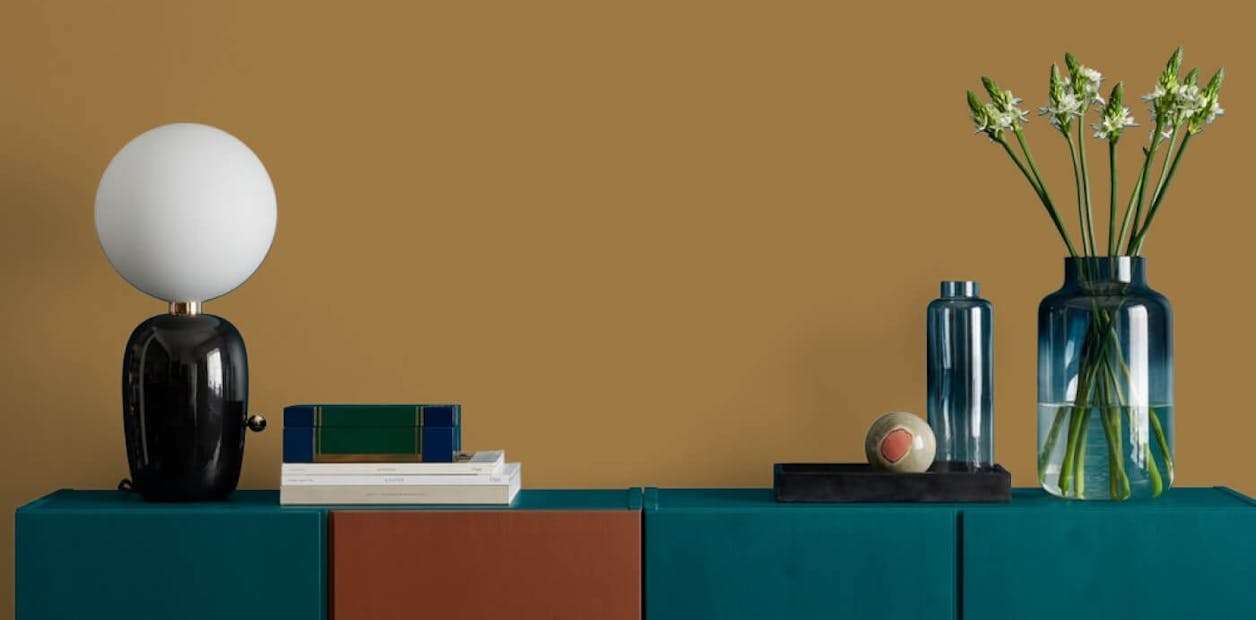 Walls look sophisticated and can be an inspiration when you find the perfect shade of darker yellow.