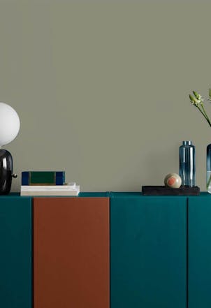deep muted sage green wall 