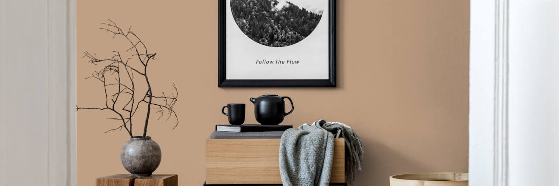A brown wall complementing a wooden floor.